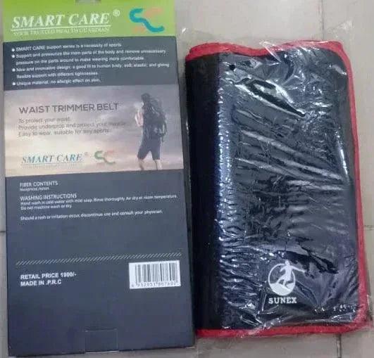Smart Care Waist Trimmer Belt in packaging with a black fitness waist wrap
